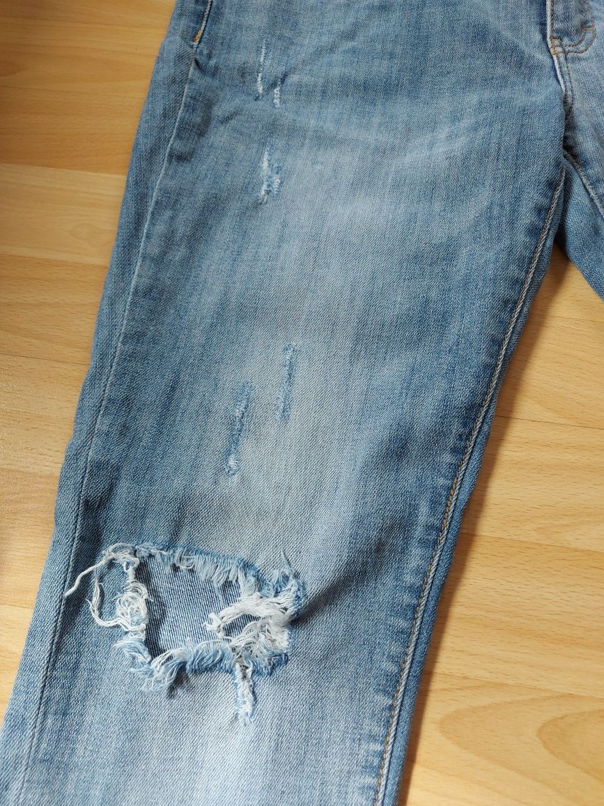 Damskie jeansy z dziurami/rozdarciami rozm. 42