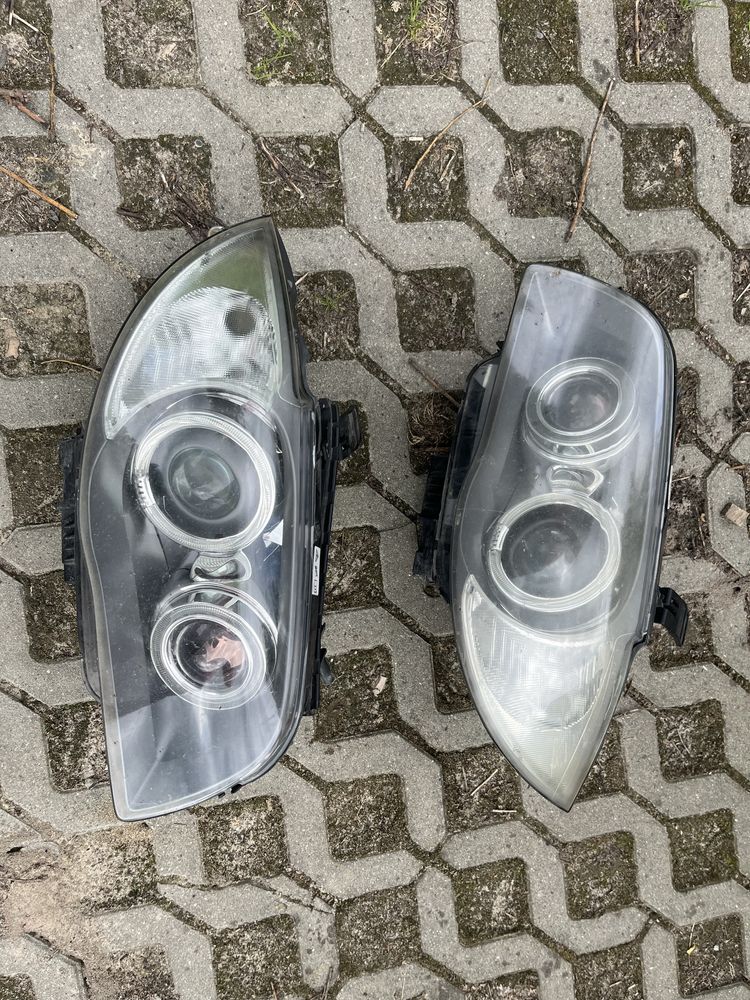 BMW 1 E82 E88 E87 LIFT 07-11 Lewy Reflektor