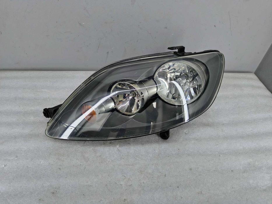 Lampa Reflektor Lewy VW Golf V PLUS