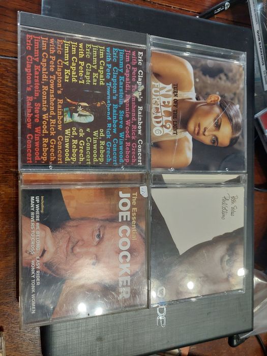 4 CDS nelly furtado Phil collins joe cocker clapton eric