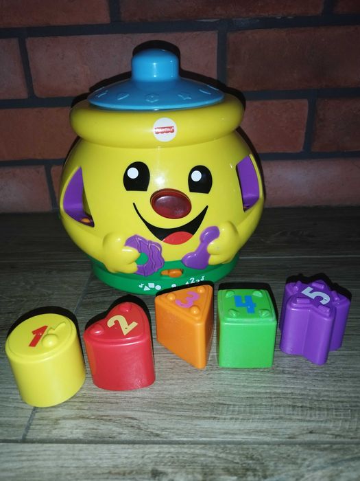 Garnuszek ,sorter kształtów Fisher- Price.