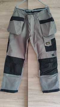 Spodnie robocze Snickers 3214 Canvas+ Stretch 48,50,52,54