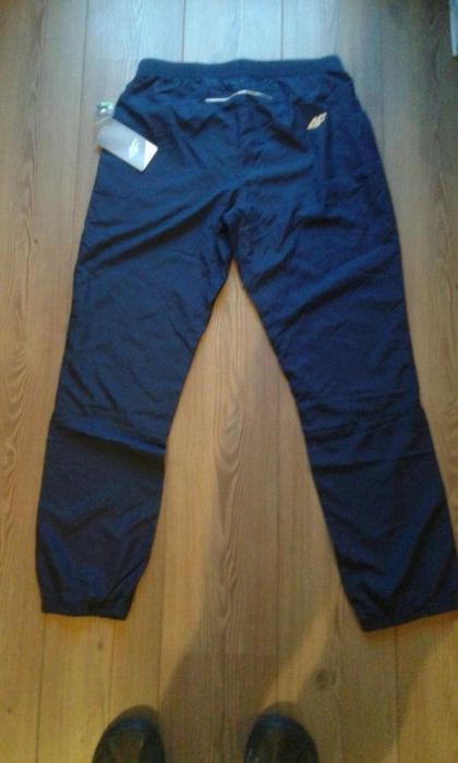 WYPRZEDAŻ Nowe spodnie dresowe firmy 4f męskie rozmiar M