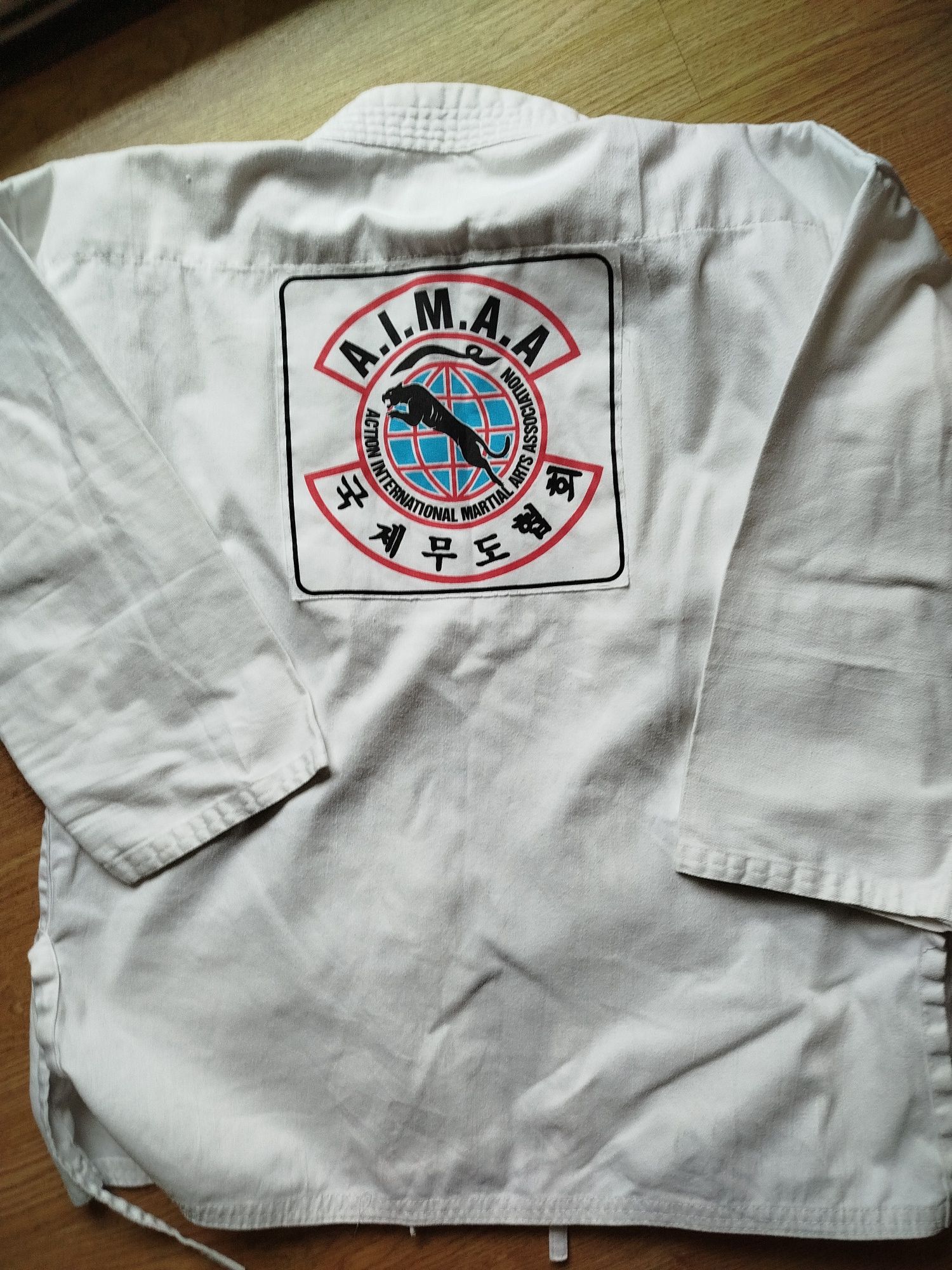 BLITZ biała bluza do sportów na przykład karate rozmiar 160 cm