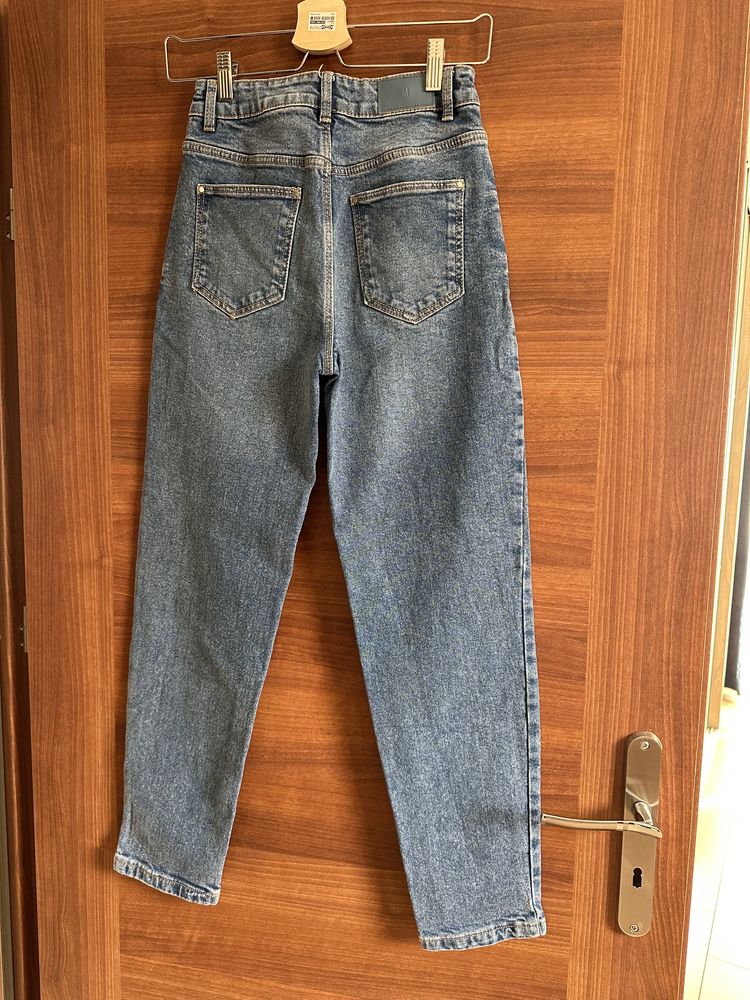 Spodnie jeansy Mohito 32