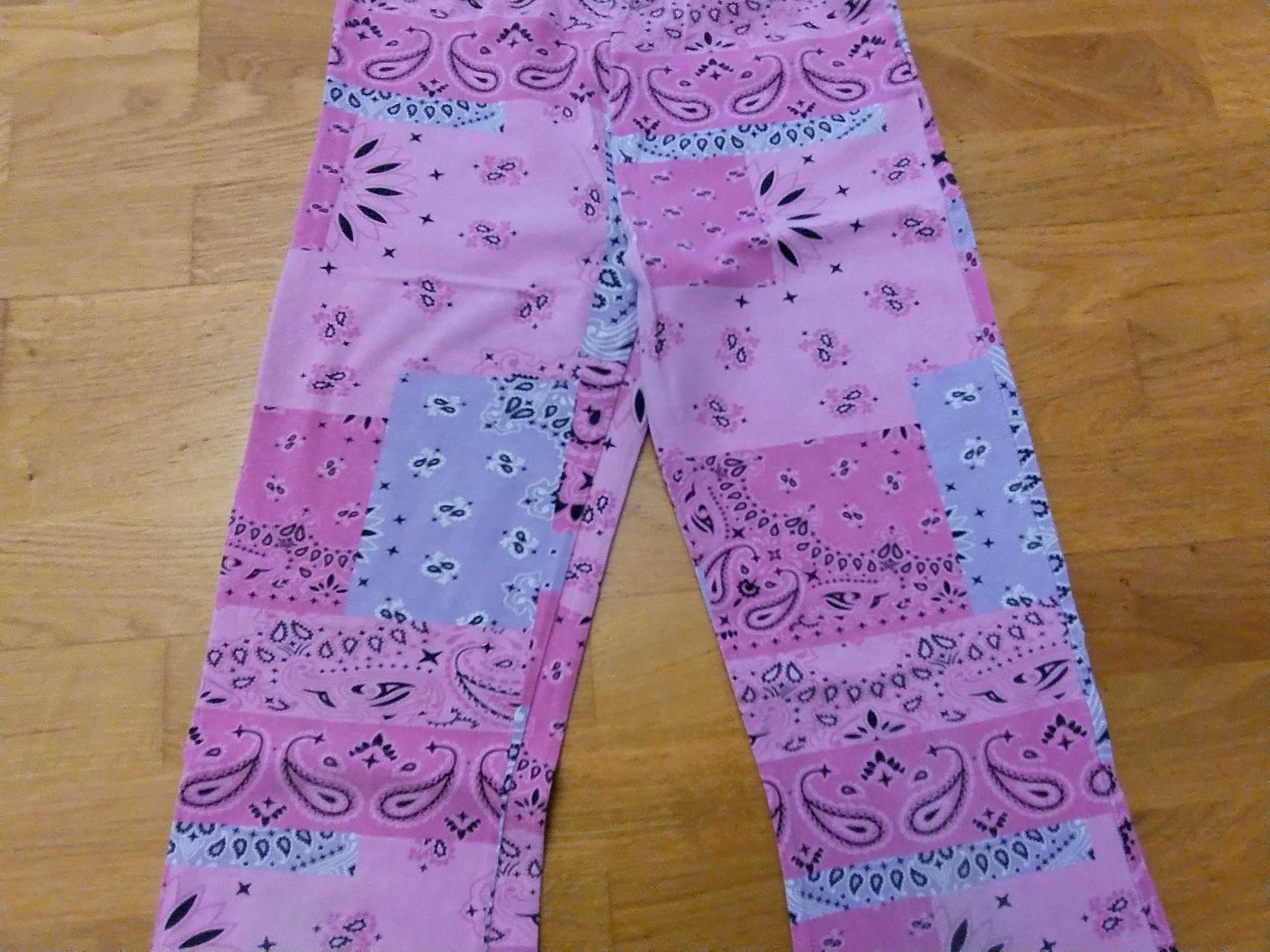 Legginsy dzwony Coccodrillo 158 spodnie materiałowe dziewczęce różowe