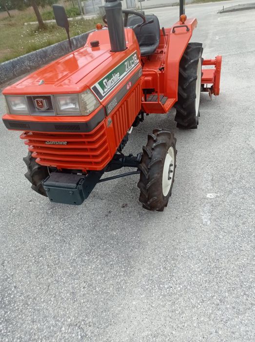 Trator com Frese Kubota Sunshine