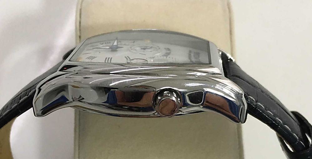 Erken relógio multifunções em aço polido