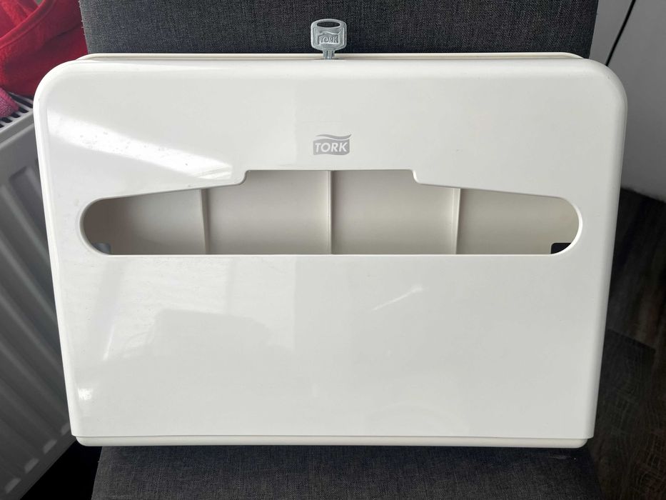 Диспенсер TORK для покриттів на сидіння унітазу білий 344080