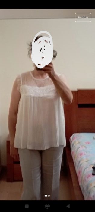 Blusa  branca com tecido bordado transparente