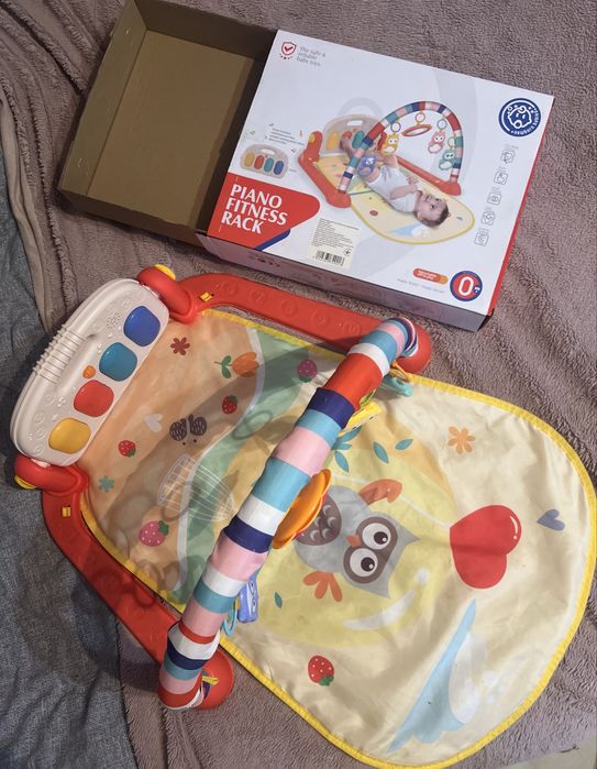 Развивающий коврик с погремушками и пианино музыкой дуга НЕ0651 Huager