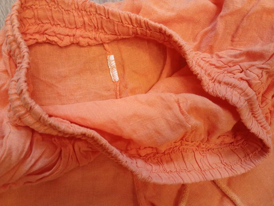 Lniane spodnie pomarańczowe