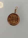 Medalha libra em ouro de 22kt com aro de 19,2kt