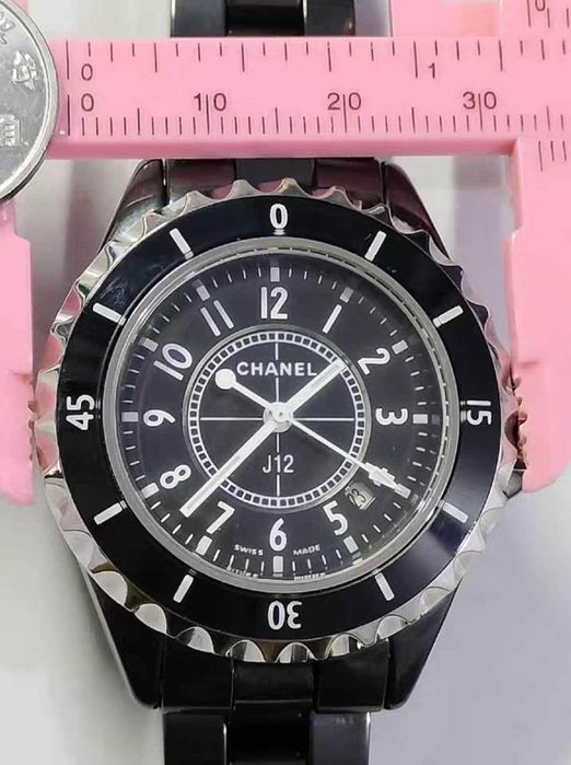 Czarny zegarek męski marki Chanel