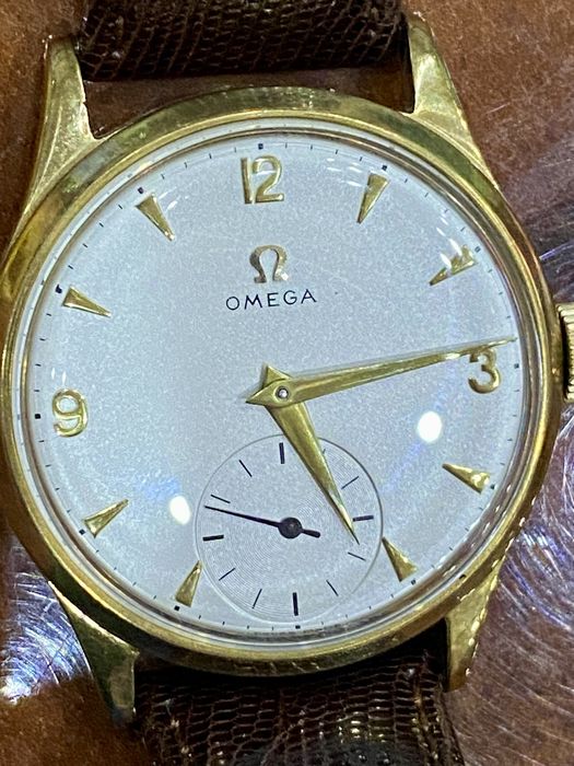 Omega męski zegarek złoto Au manualny