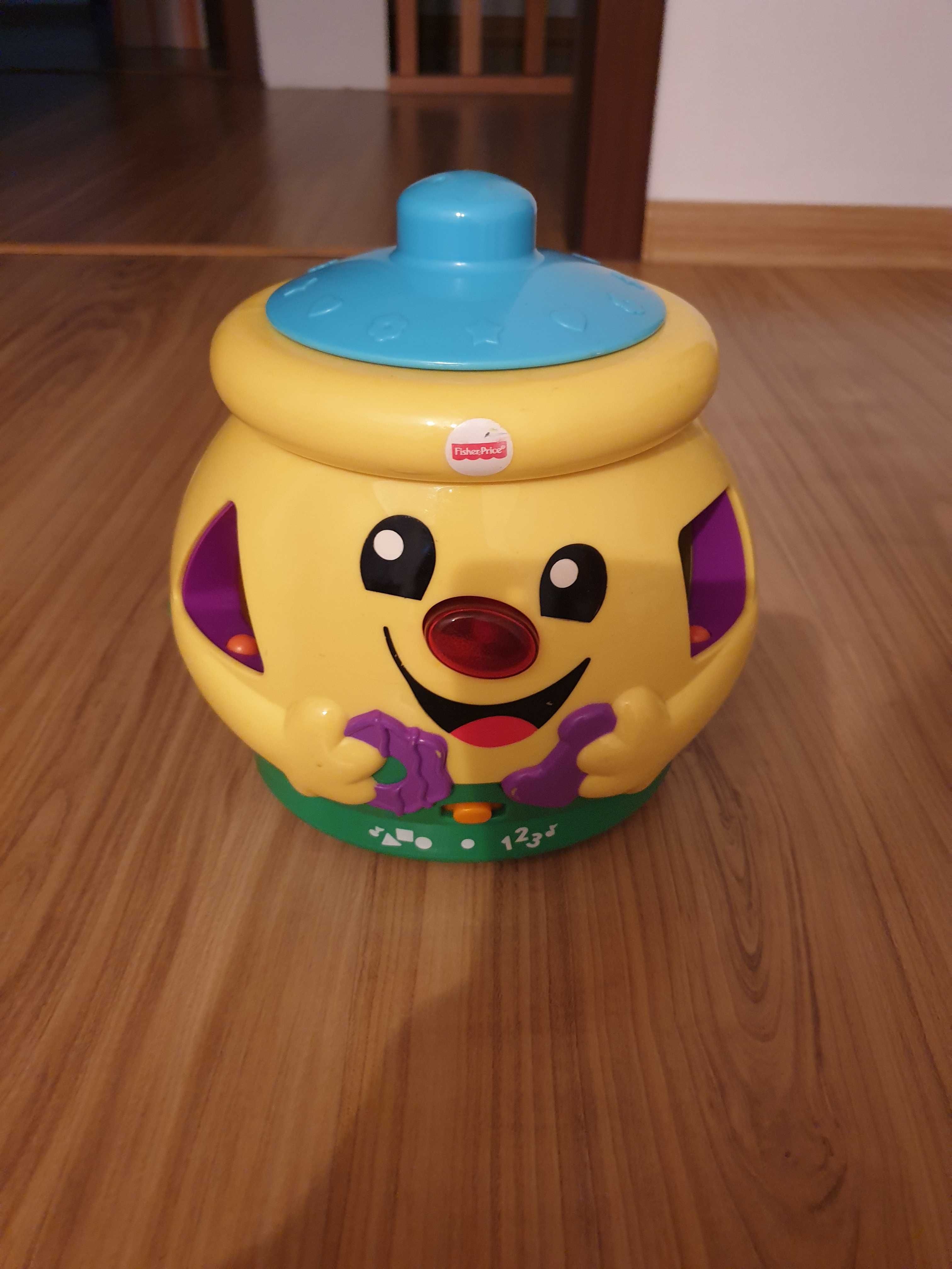 Garnuszek na klocuszek Fisher Price