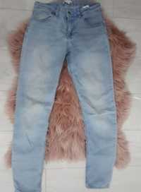 Spodnie damskie jeansy jeansowe dżins jasne niebieskie rurki H&M XS 34