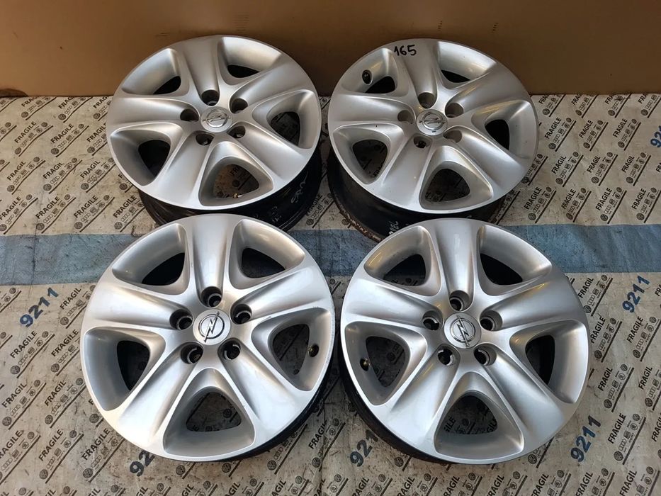 FELGI STALOWE+ KOŁPAKI  OPEL ASTRA H MERIVA B ZAFIRA B VECTRA C  5x110 6,5JX16 ET39