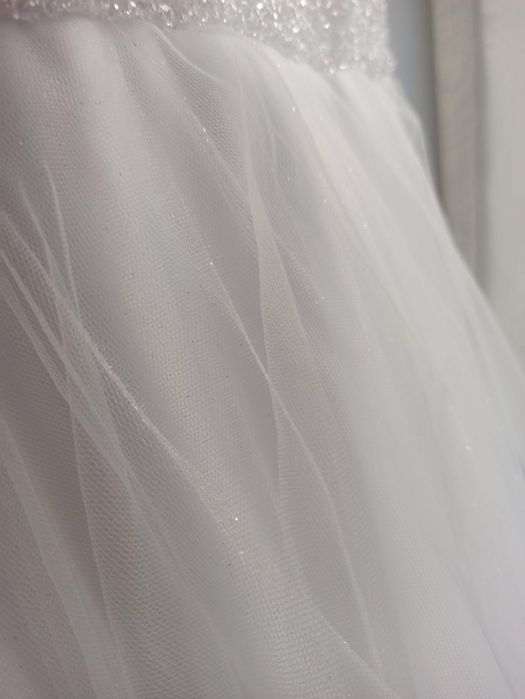 Delikatna sukienka komunijna