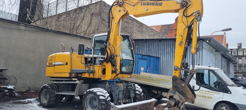 Uslugi minikoparka transport