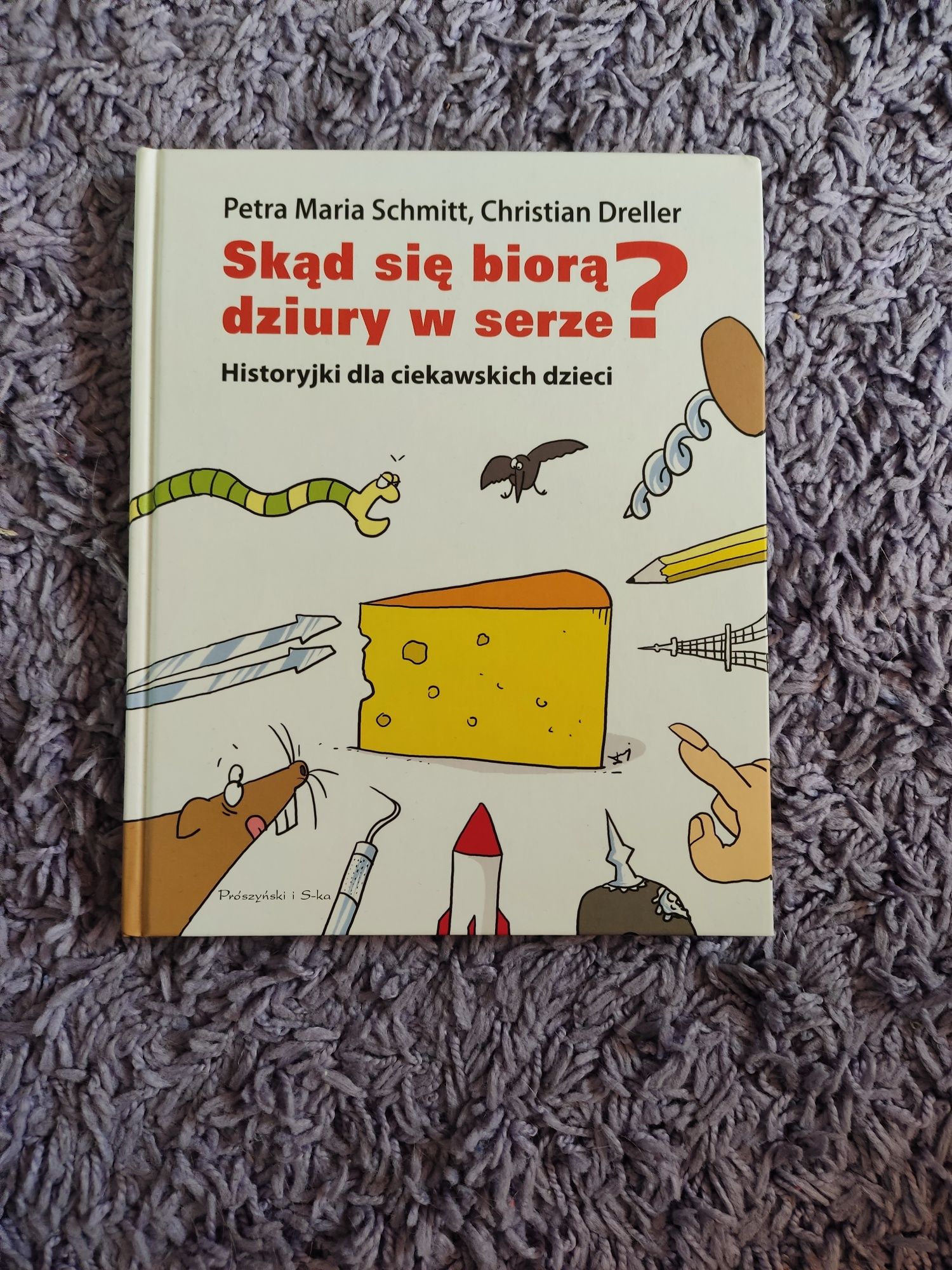 "Skąd się biorą dziury w serze?" P.M.Schmitt, Ch.Dreller