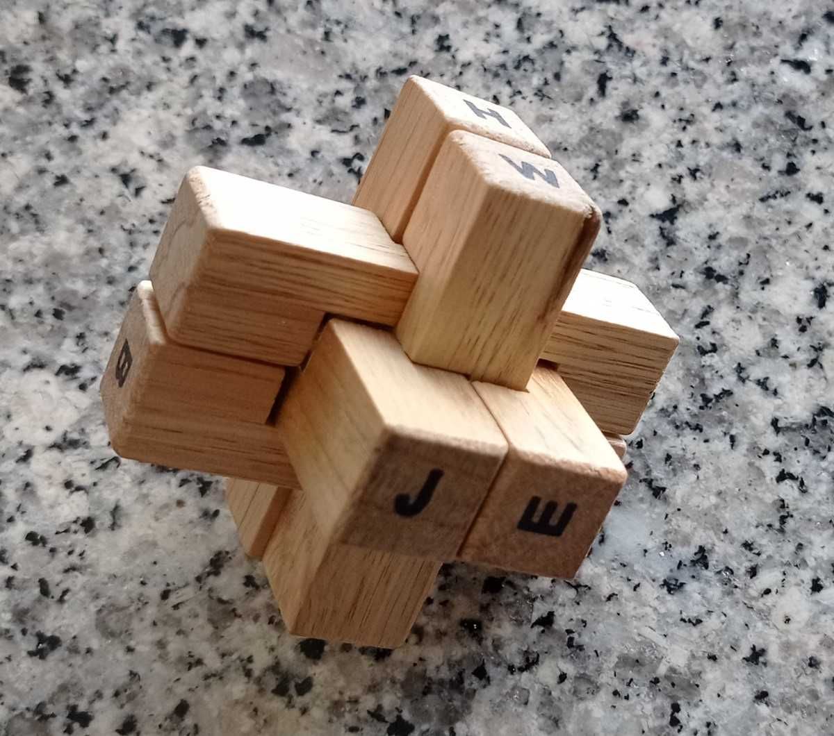 Puzzle - caixa com bastões quadrados (Quebra-cabeças)