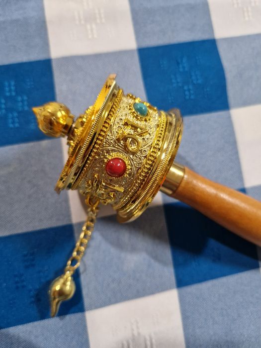 Roda de oração com pega em madeira. Nova