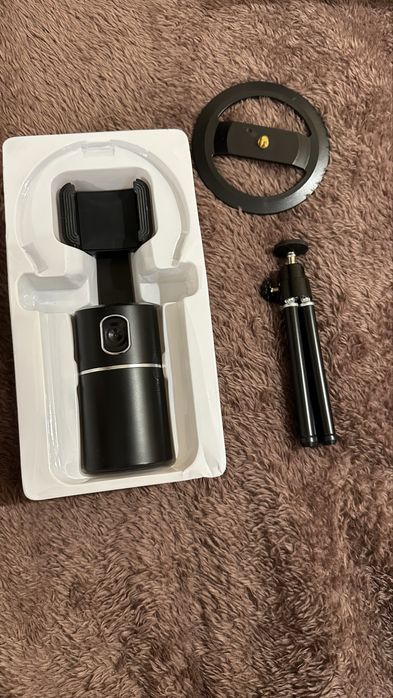 Розумний штатив з камерою і датчиком руху для смартфонів