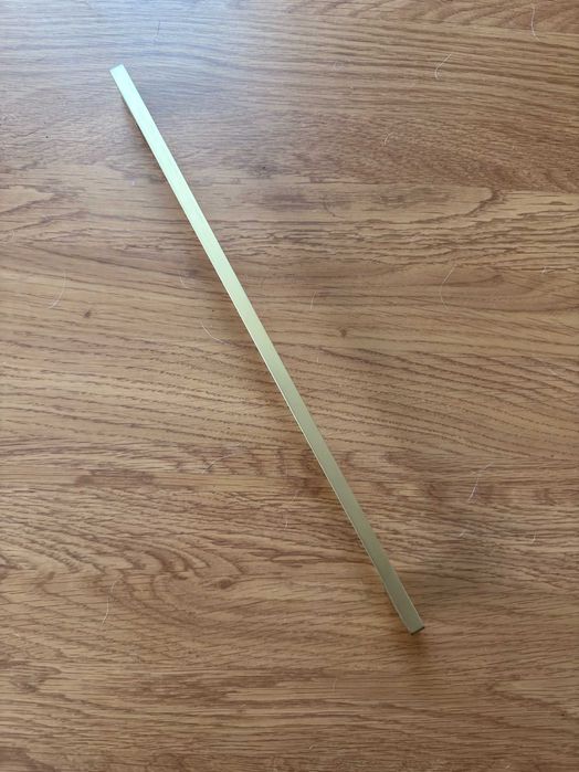 Uchwyt meblowy Gamet Techno UN 73 złoty 320 mm