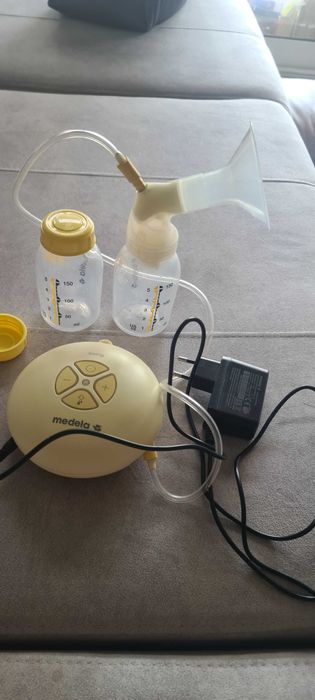 Bom de leite Medela elétrico com 2 biberoes.