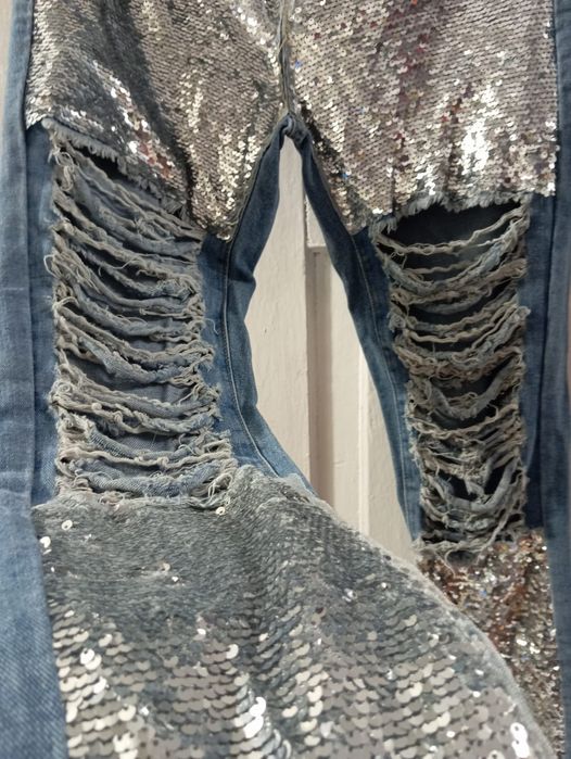 Spodnie jeans dżinsy Kendall z dziurami