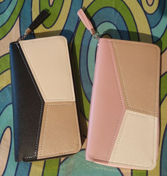 Malas e carteiras novas