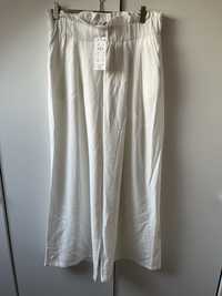 Białe przepiękne szerokie spodnie L XL wiskoza