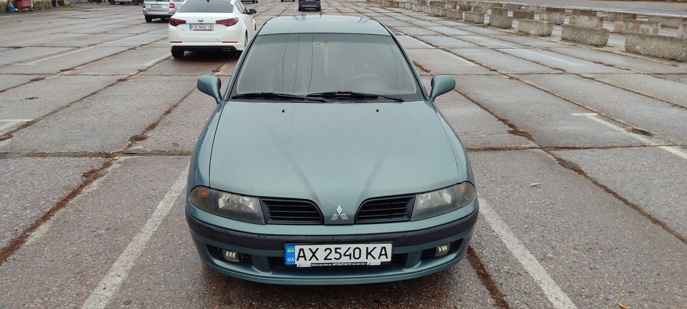 Мицубиси Каризма 2003г  1.6 газ/бенз