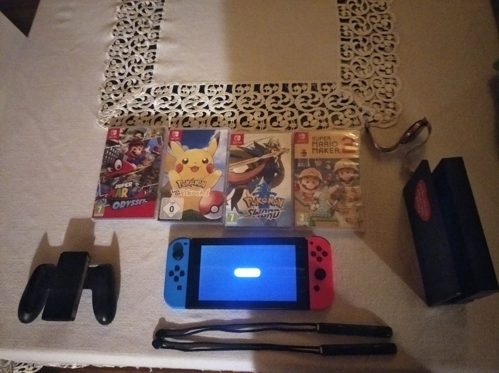 Nintendo switch + 4 gry