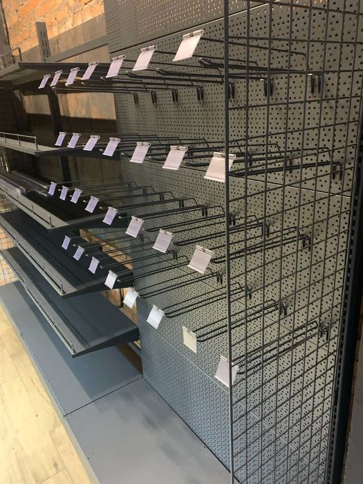 Торгові стелажі. Прилавки каси. Гачки перфорація. Торгове обладнання