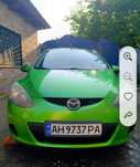 Маленька, економна Mazda 2
