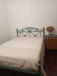 Quarto casal e mesas de cabeceira