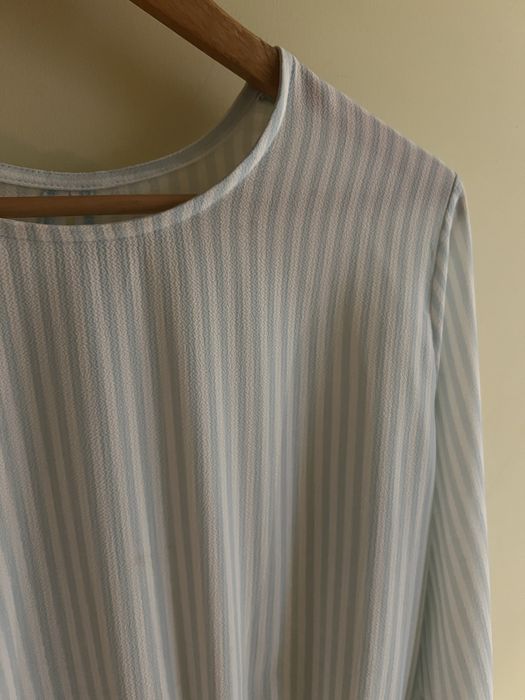 Blusa com folho de manga comprida