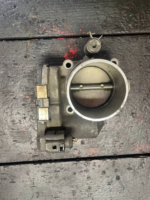 Дроссельная заслонка Skoda Octavia tour 1.8t Golf 4 06A133062C