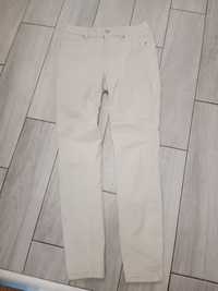 Spodnie jeans kremowe r. 29