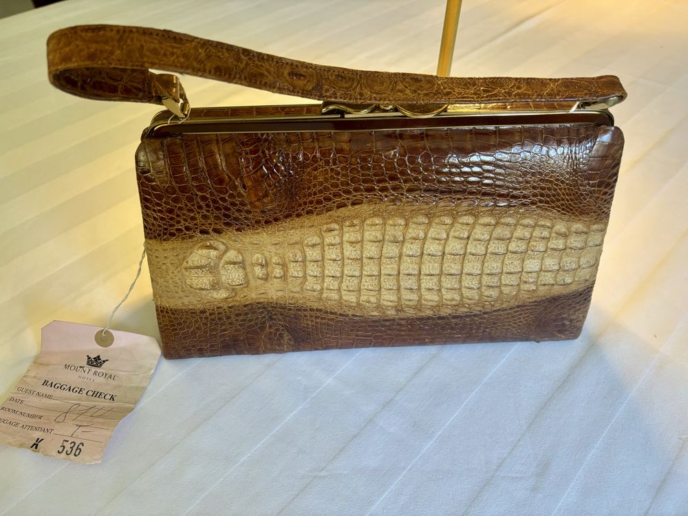Mala em pele de crocodilo verdadeira