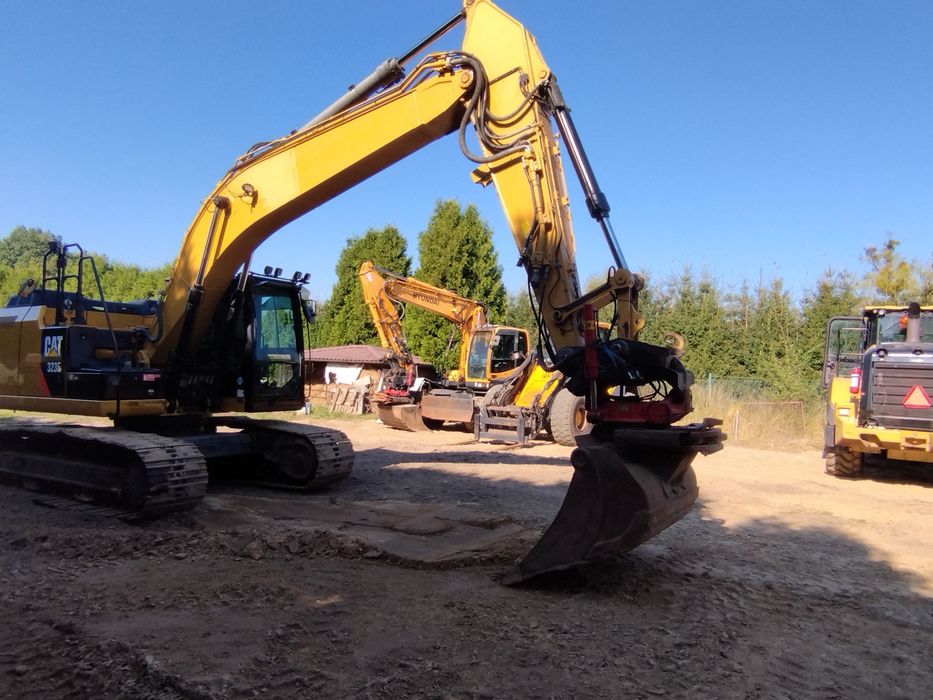Koparka CAT 323E, gasienica CAT 950M