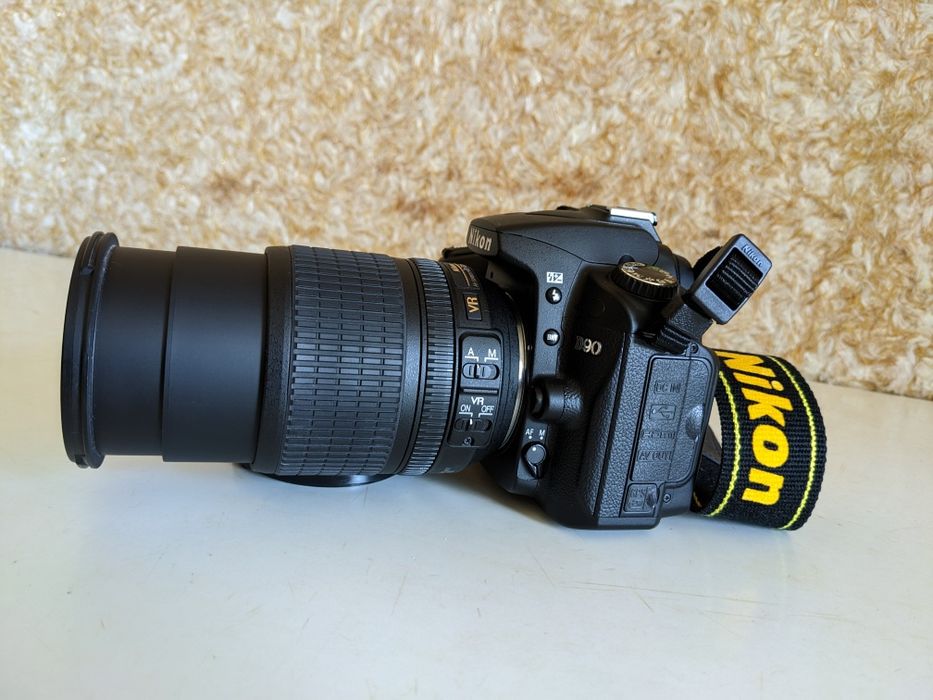 Nikon D90 AF-S 18-105 ED VR  як новий маленький пробіг