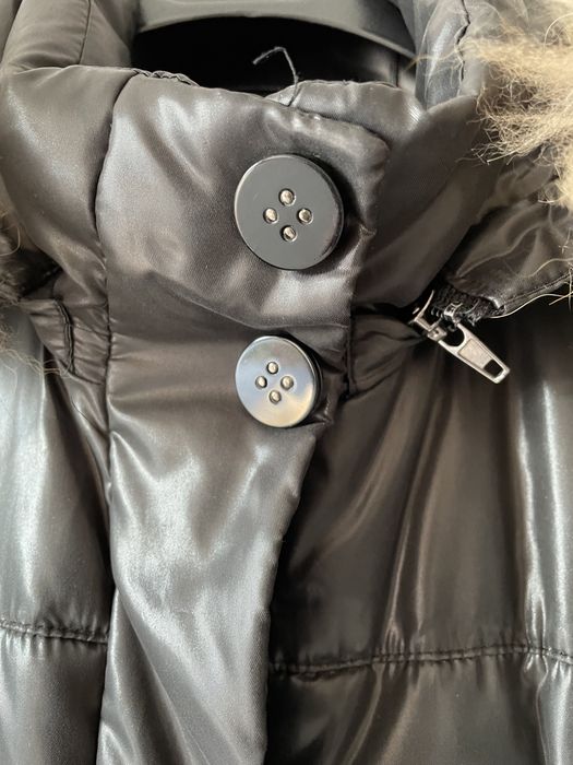 Kispo de penas com pelo no carapuço