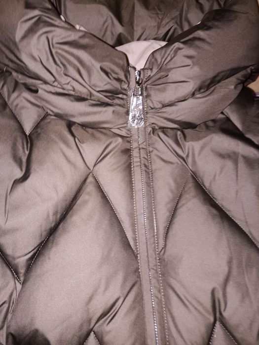 Продам нову зимову куртку 52р