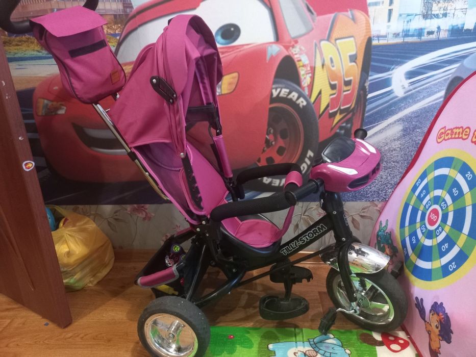 Продам детский велосипед с ручкой