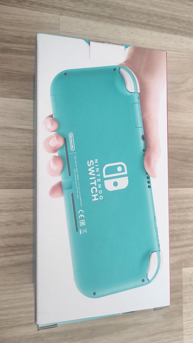 Nowa, nierozpakowana konsola Nintendo Switch Lite na gwarancji