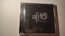 Afi Sing the sorrow. Okładka albumu