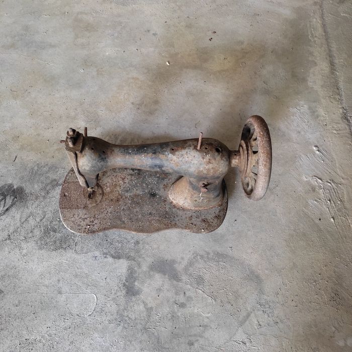 Cabeça de máquina de costura antiga
